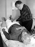 Bob Duggan and other volunteer acupuncturists provide individual full-body treatment.