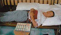 Patient recieves electrical stimulation to his chi.