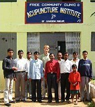 Brett Bloomberg and staff standing in front of the Acupuncture institute.
